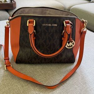 Michael Kors satchel. Has shoulder strap attached. Gently used.